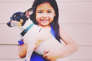 Student holding dog -- inquiry