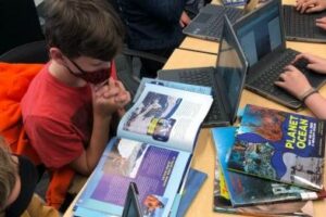 Kids reading science book