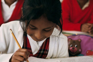 "Girl-in-a-classroom"-by-World-Bank-Photo-Collection-is-licensed-under-CC-BY-NC-ND-2.0.
